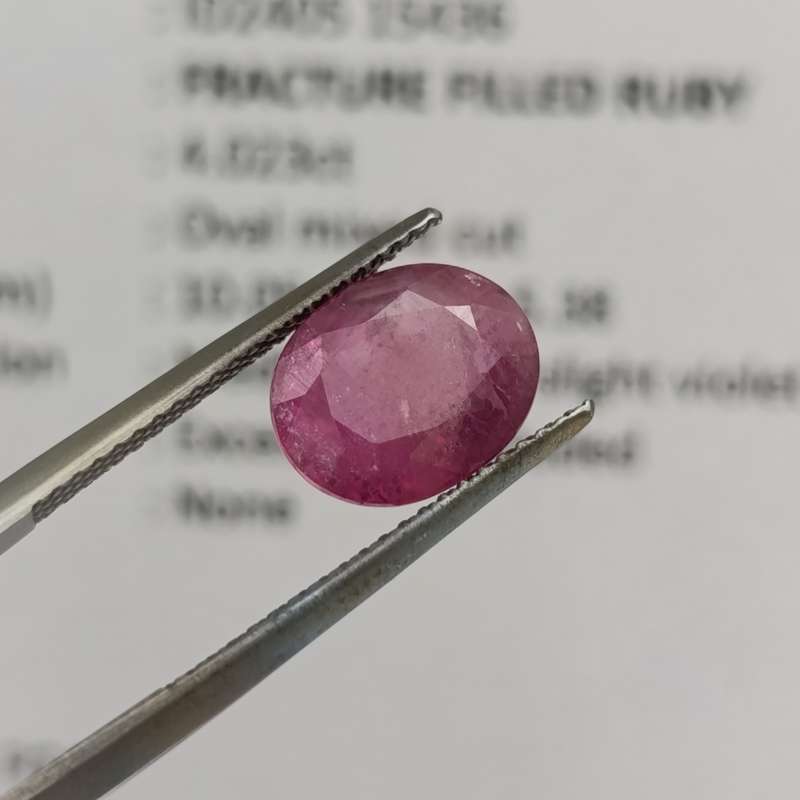 Fracture filled Ruby slight violet red Oval mixed cut 4.02 carat with Gemlab certificate