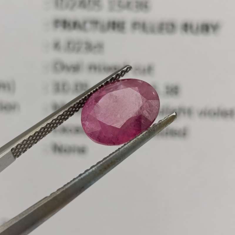 Fracture filled Ruby slight violet red Oval mixed cut 4.02 carat with Gemlab certificate