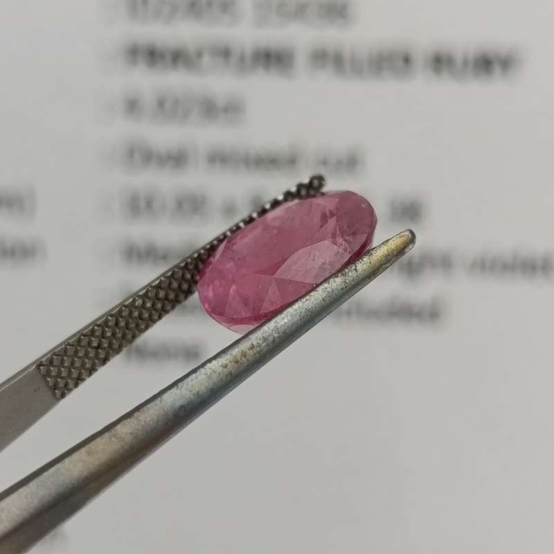Fracture filled Ruby slight violet red Oval mixed cut 4.02 carat with Gemlab certificate