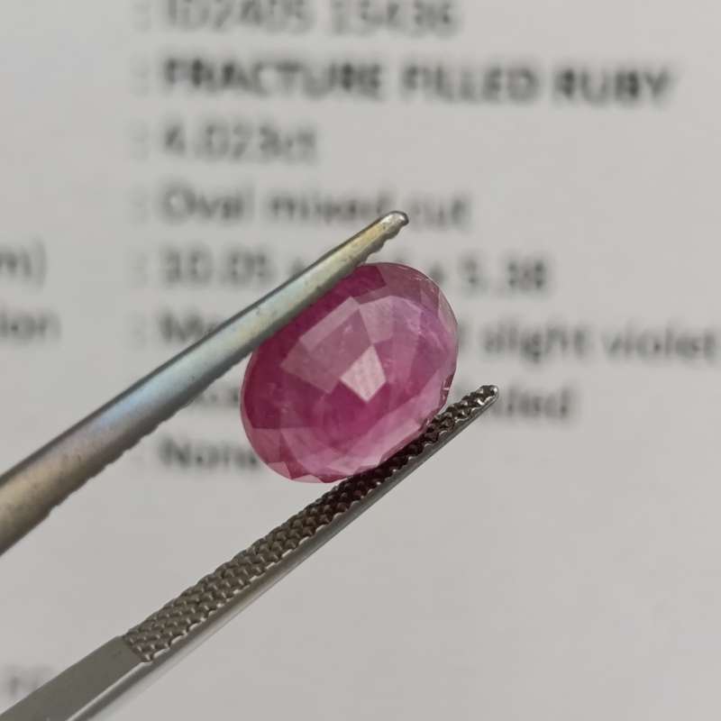 Fracture filled Ruby slight violet red Oval mixed cut 4.02 carat with Gemlab certificate