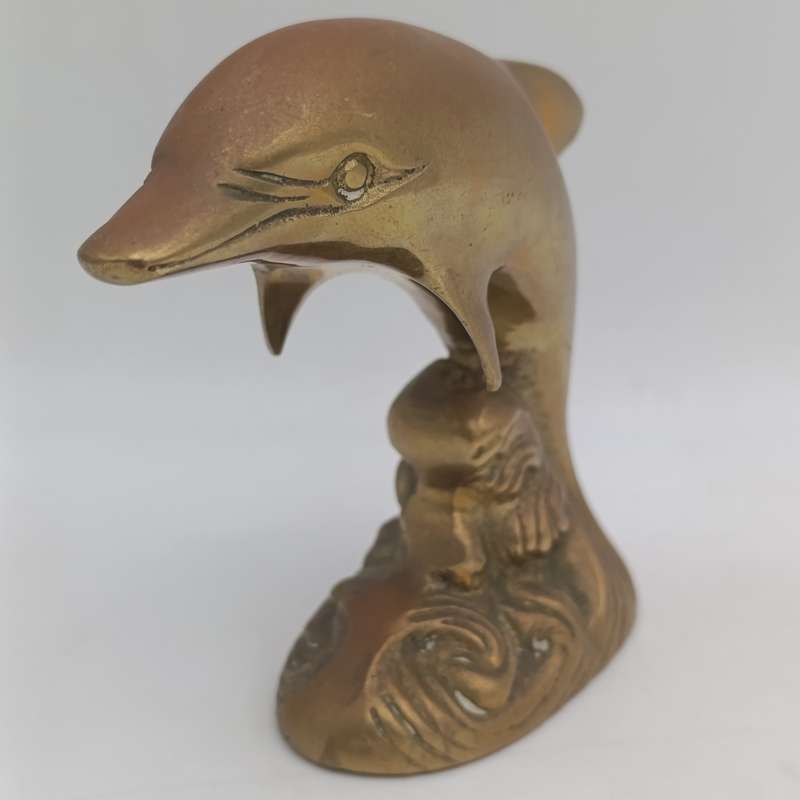 Vintage brass dolphin figurine