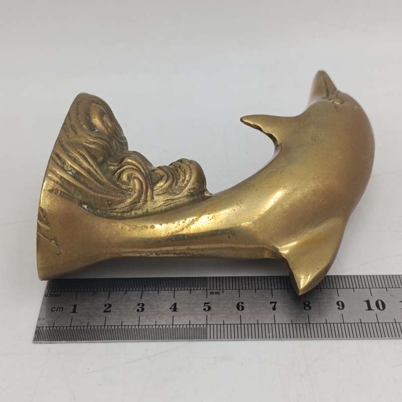 Vintage brass dolphin figurine