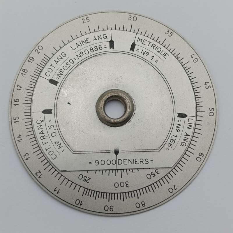 Vintage slide rule disk calculator