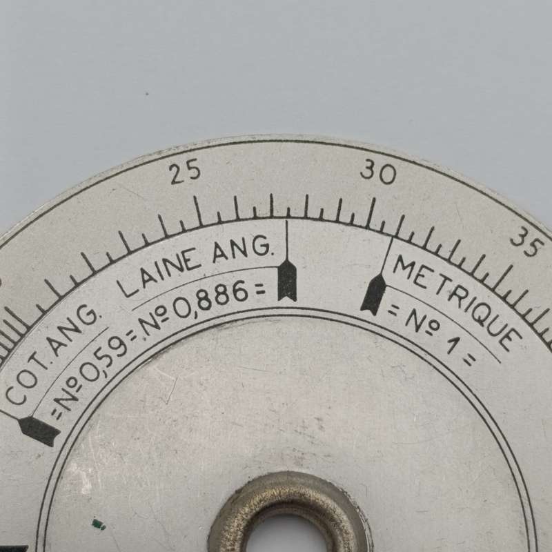 Vintage slide rule disk calculator