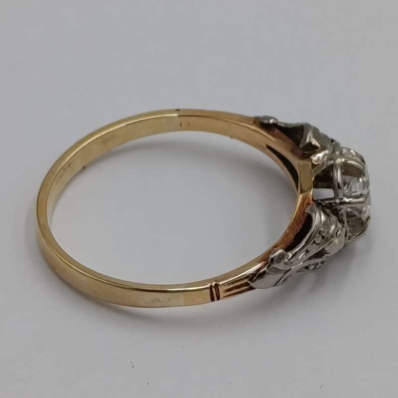 Antique 18kt white and yellow gold ring with a 20 plus pointer diamond
