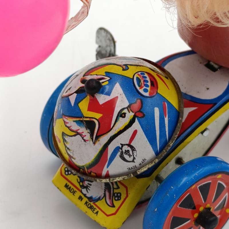 Vintage Tinplate Mechanical Girls tricycle toy in box - working