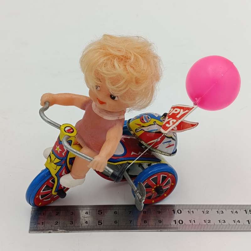 Vintage Tinplate Mechanical Girls tricycle toy in box - working