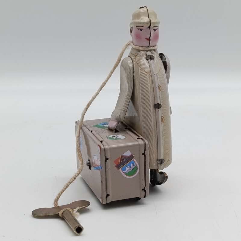 Collectible MS472 mechanical traveller tinplate toy