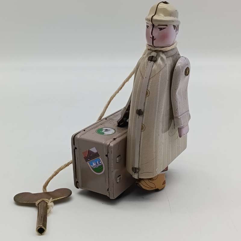 Collectible MS472 mechanical traveller tinplate toy