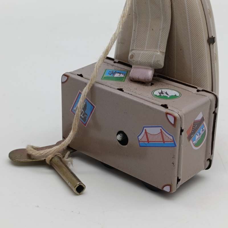 Collectible MS472 mechanical traveller tinplate toy