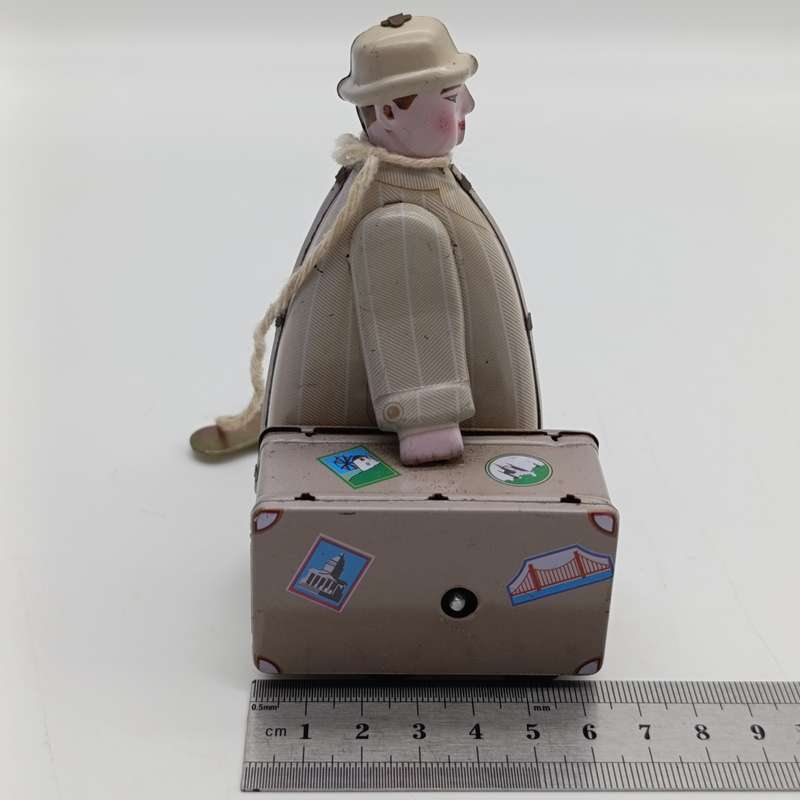 Collectible MS472 mechanical traveller tinplate toy