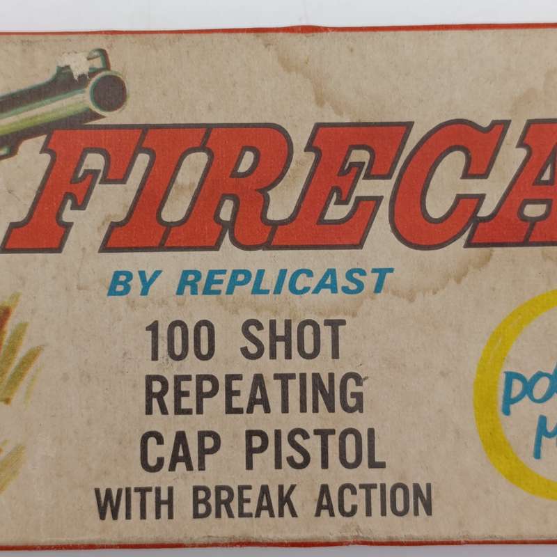 Vintage Firecat by Replicast 100 shot repeating cap pistol with break action - mint boxed