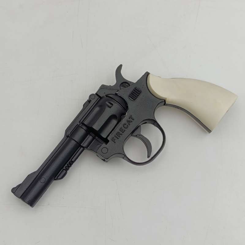 Vintage Firecat by Replicast 100 shot repeating cap pistol with break action - mint boxed
