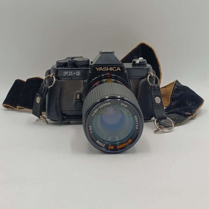Vintage Yashica FX-3 35mm camera with Hanimex T21 flash in bag - shutter working