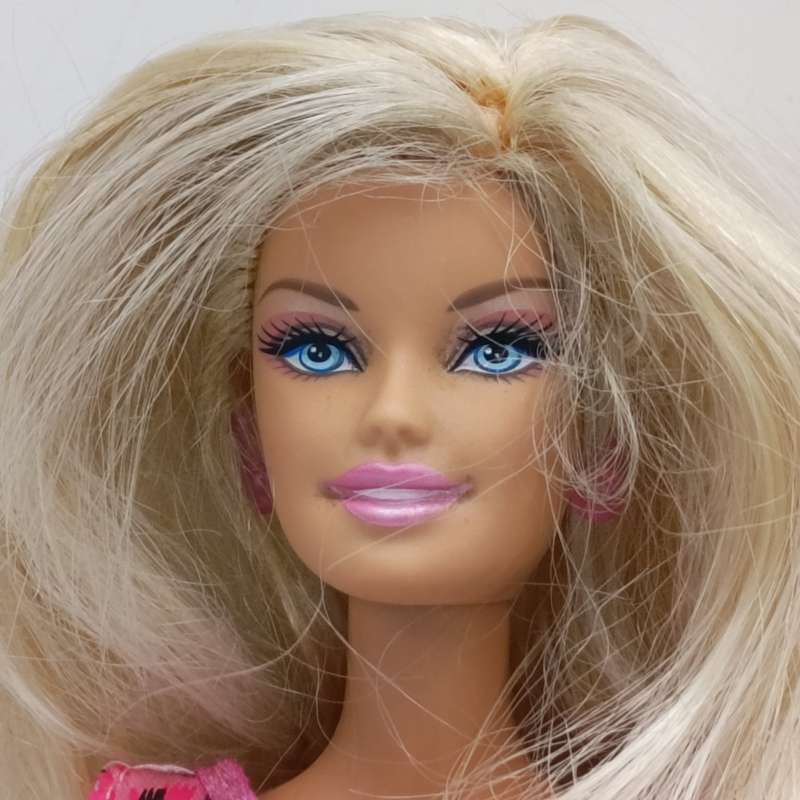 Two dolls fully clothed