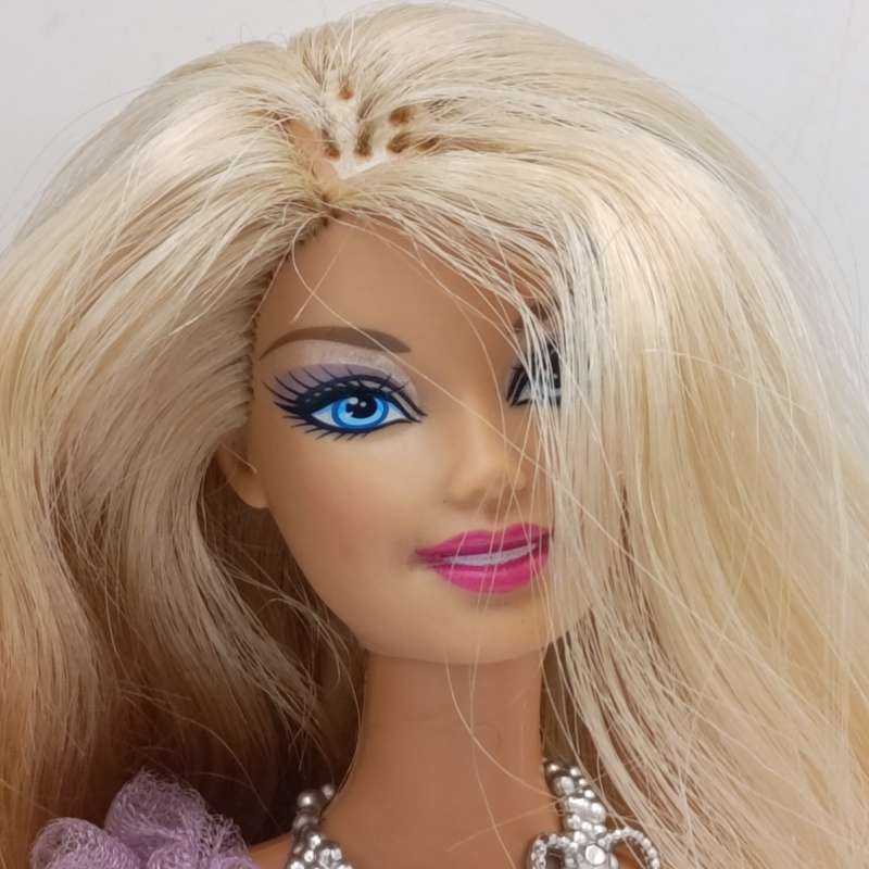 Two dolls fully clothed