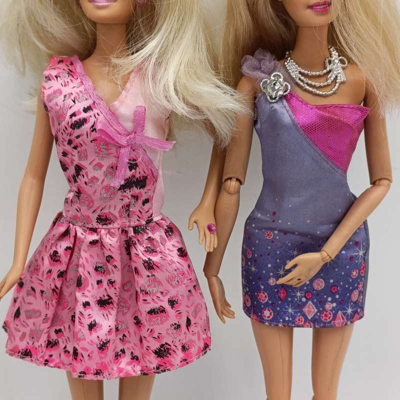 Two dolls fully clothed