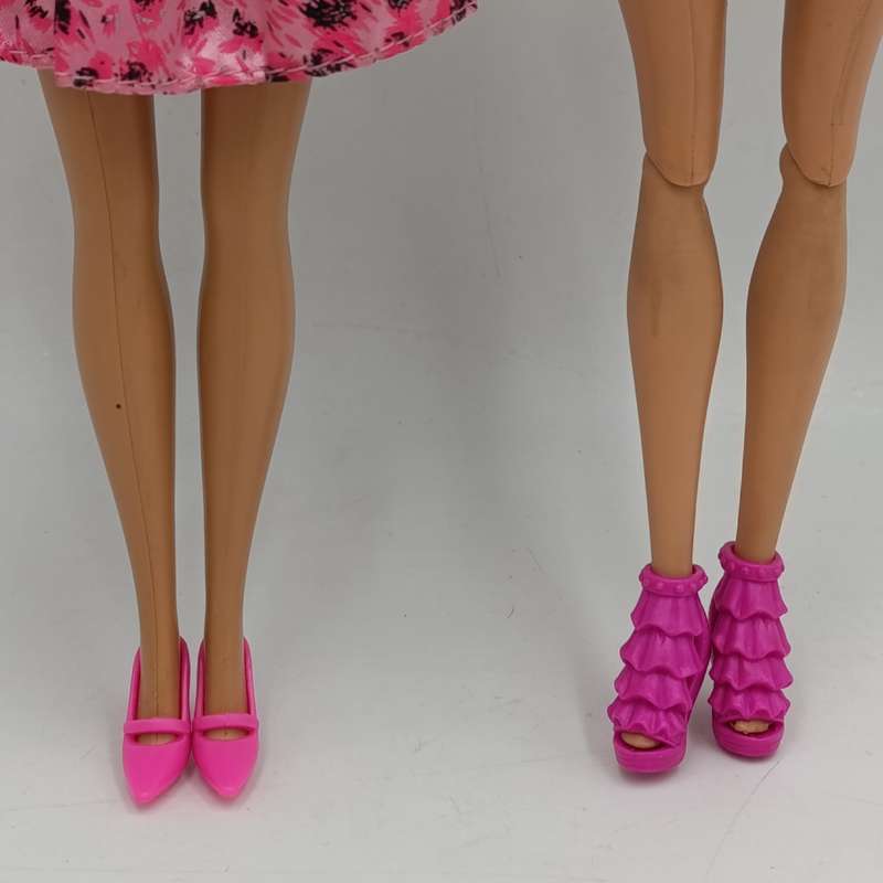 Two dolls fully clothed