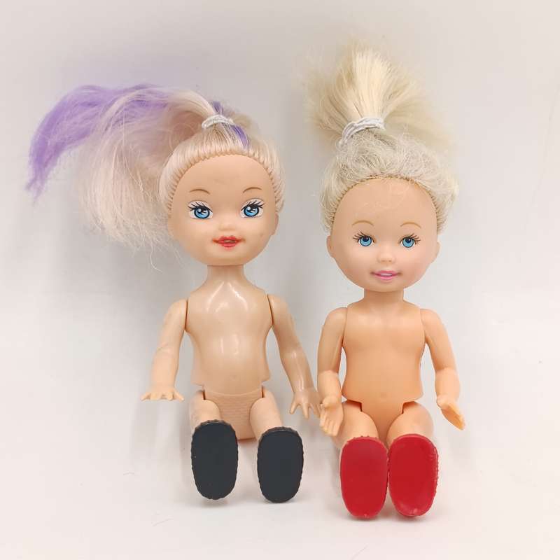 Two young girl dolls - No clothes