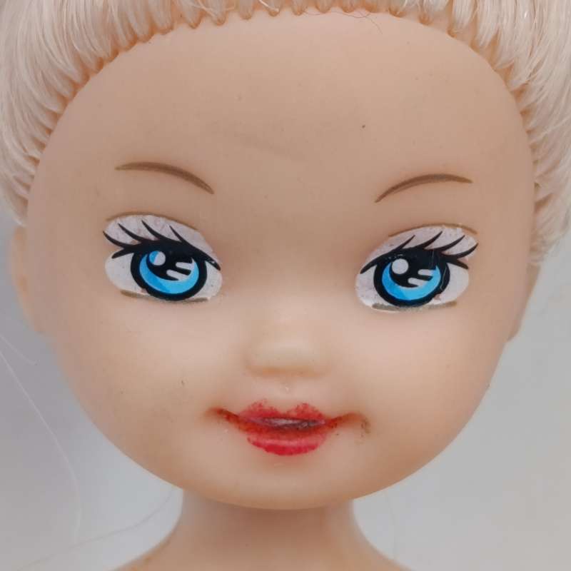 Two young girl dolls - No clothes