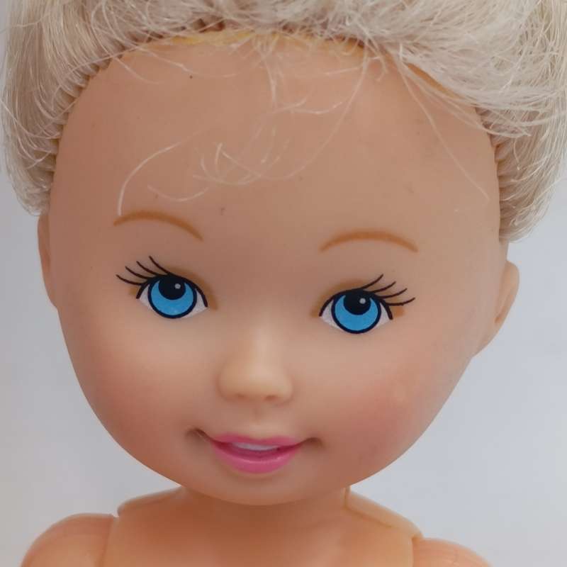 Two young girl dolls - No clothes
