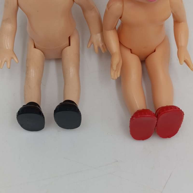 Two young girl dolls - No clothes