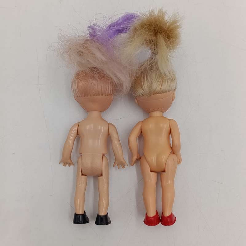 Two young girl dolls - No clothes