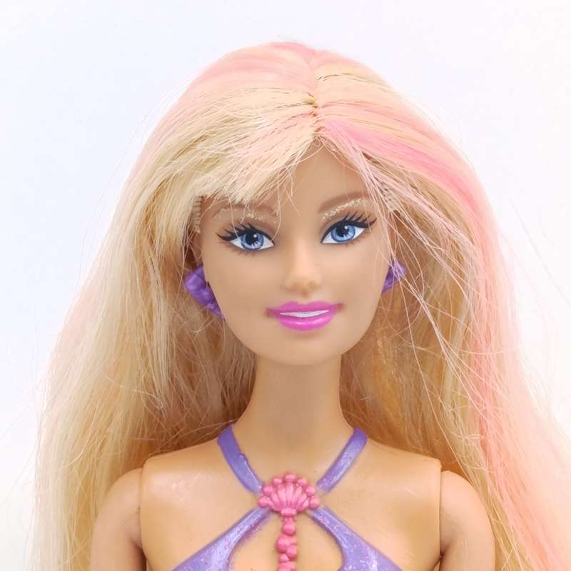 Mermaid Barbie doll with moving tail