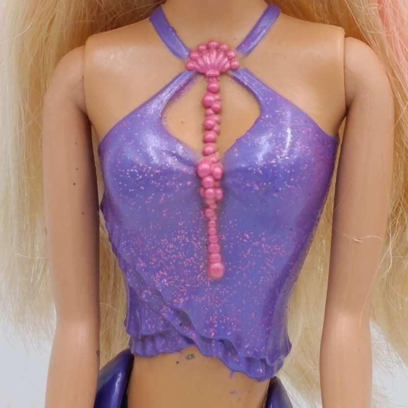Mermaid Barbie doll with moving tail