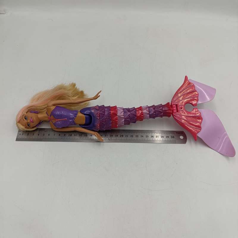 Mermaid Barbie doll with moving tail