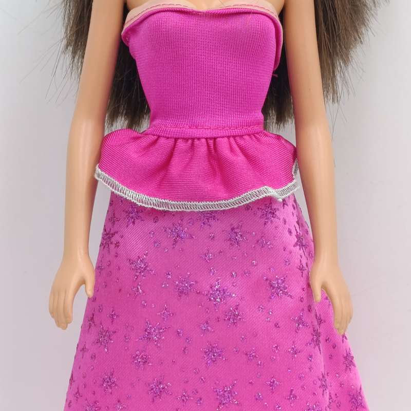 Barbie with pink dress, shoes and necklace