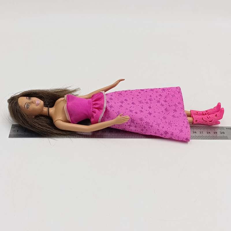 Barbie with pink dress, shoes and necklace