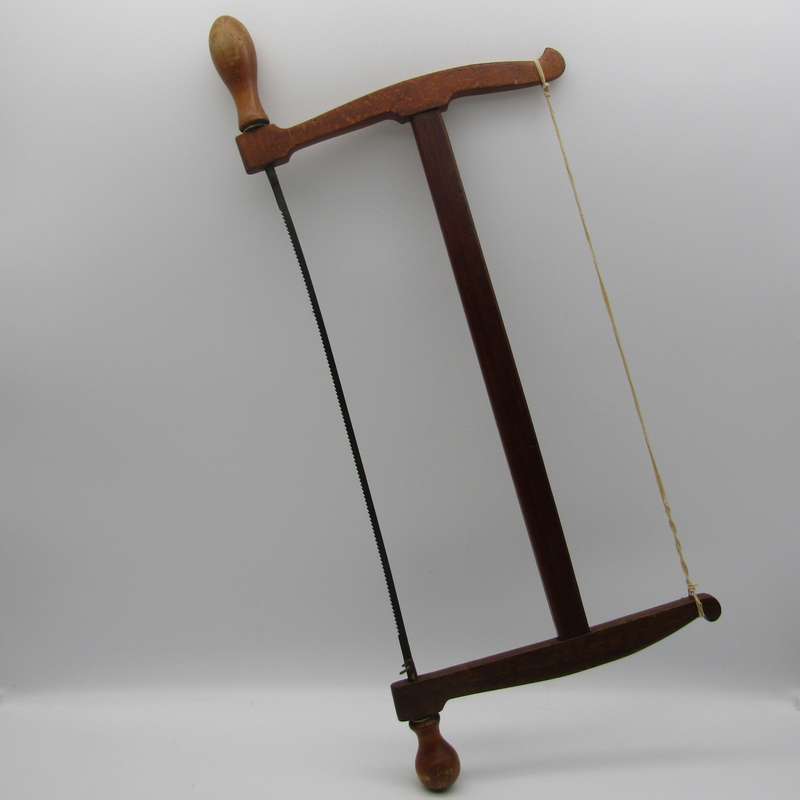 Antique wooden bow saw