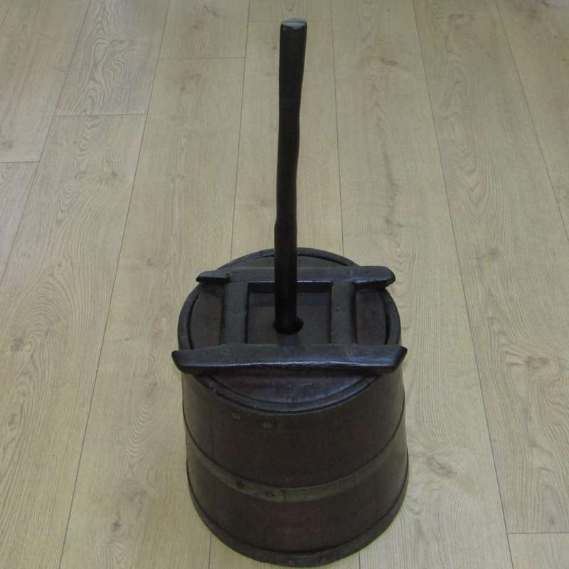 Antique wooden butter churn with stomper