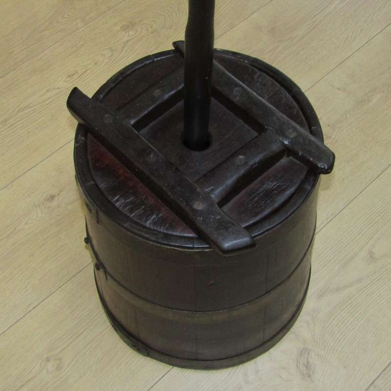 Antique wooden butter churn with stomper
