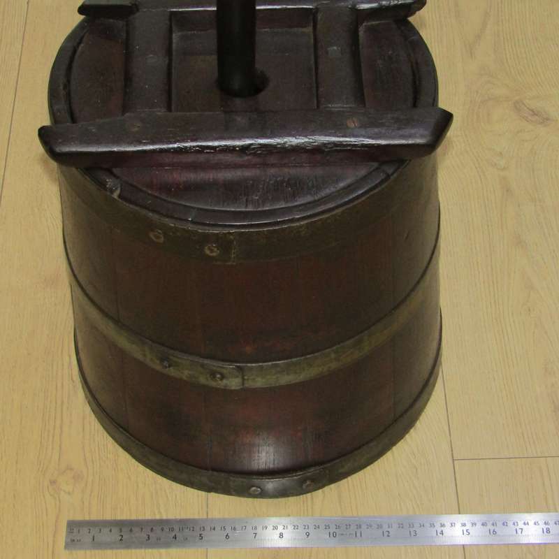 Antique wooden butter churn with stomper