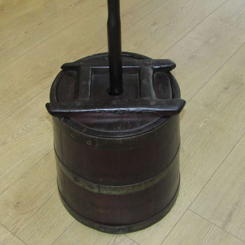 Antique wooden butter churn with stomper