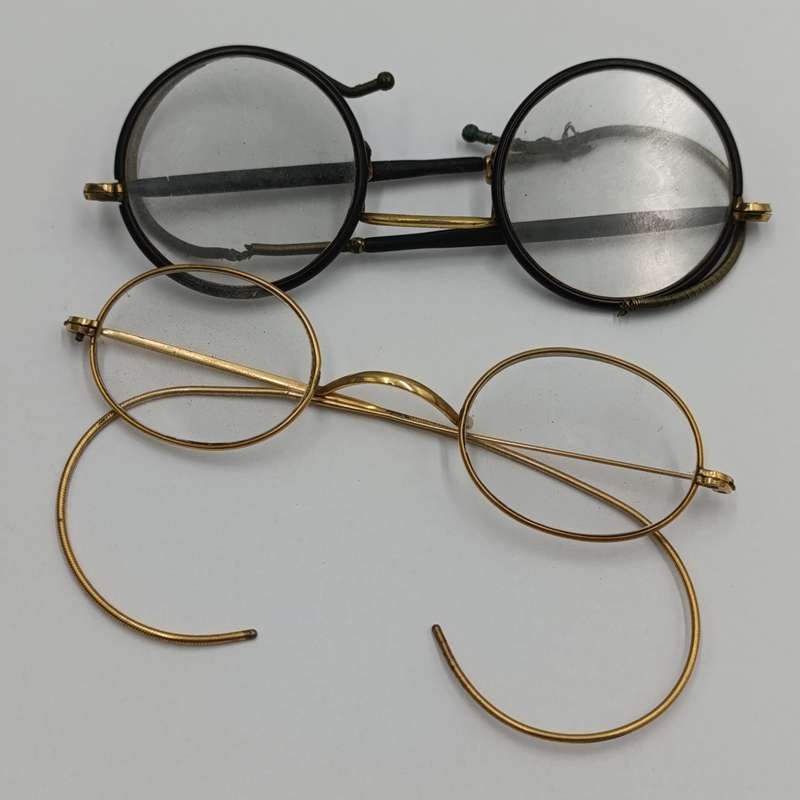 Pairs of Antique prescription glasses in case