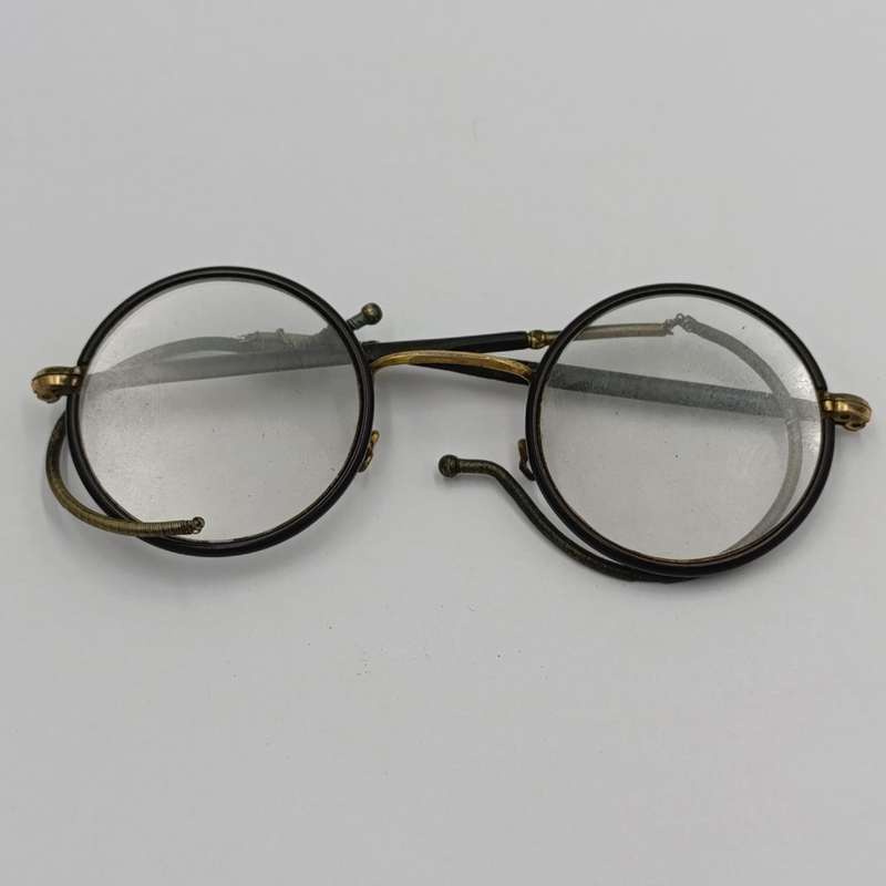 Pairs of Antique prescription glasses in case