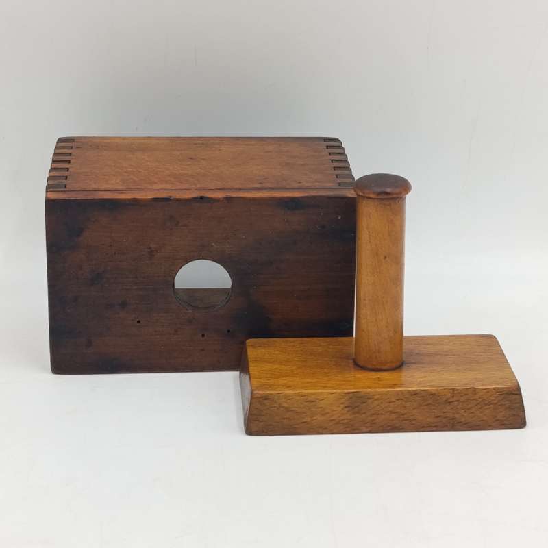 Antique wooden butter mould and press