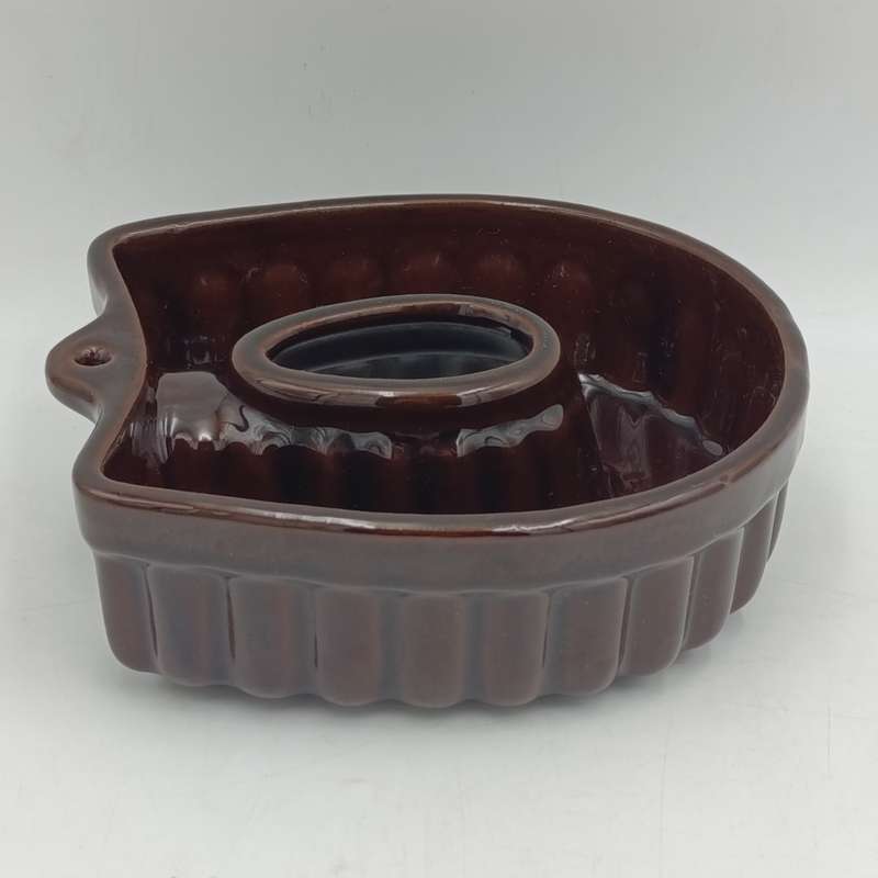 Antique ceramic horseshoe shaped jelly mould/cake mould