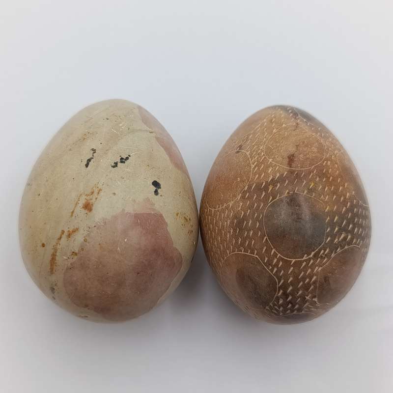Pair of vintage soap stone eggs