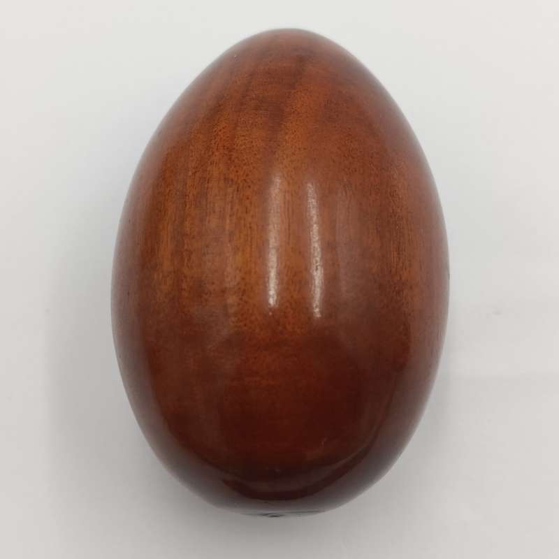Pair of wooden carved eggs