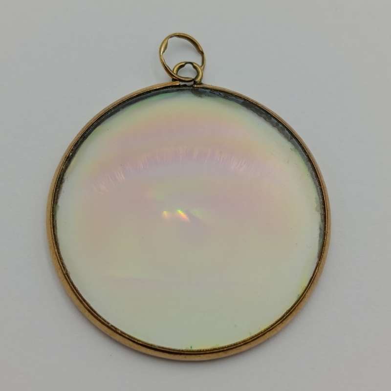 Vintage Hologram eye pendant with 9kt Gold surround