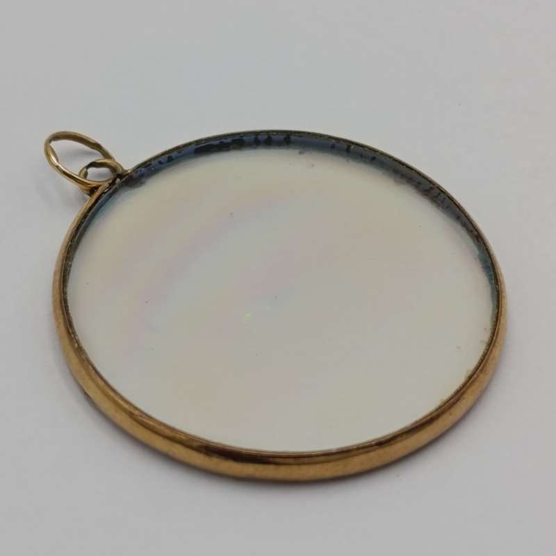 Vintage Hologram eye pendant with 9kt Gold surround