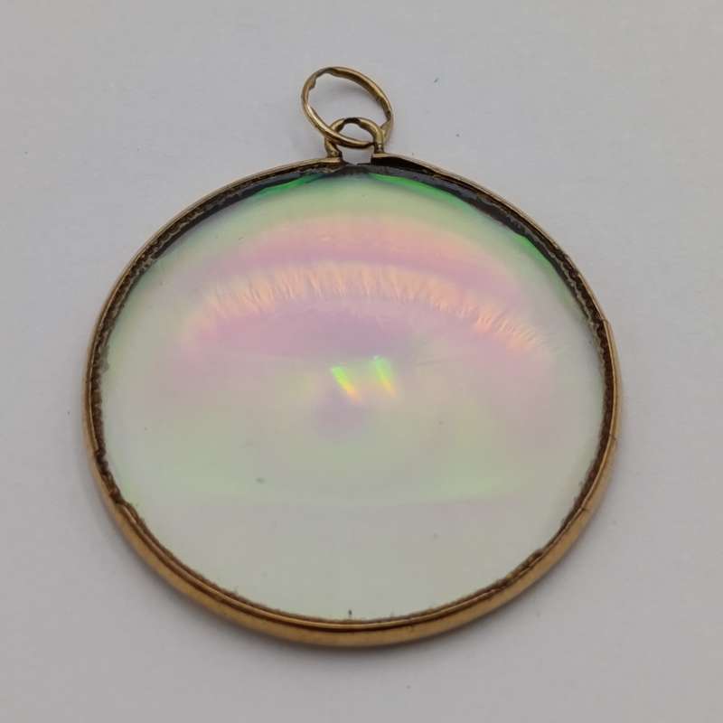 Vintage Hologram eye pendant with 9kt Gold surround