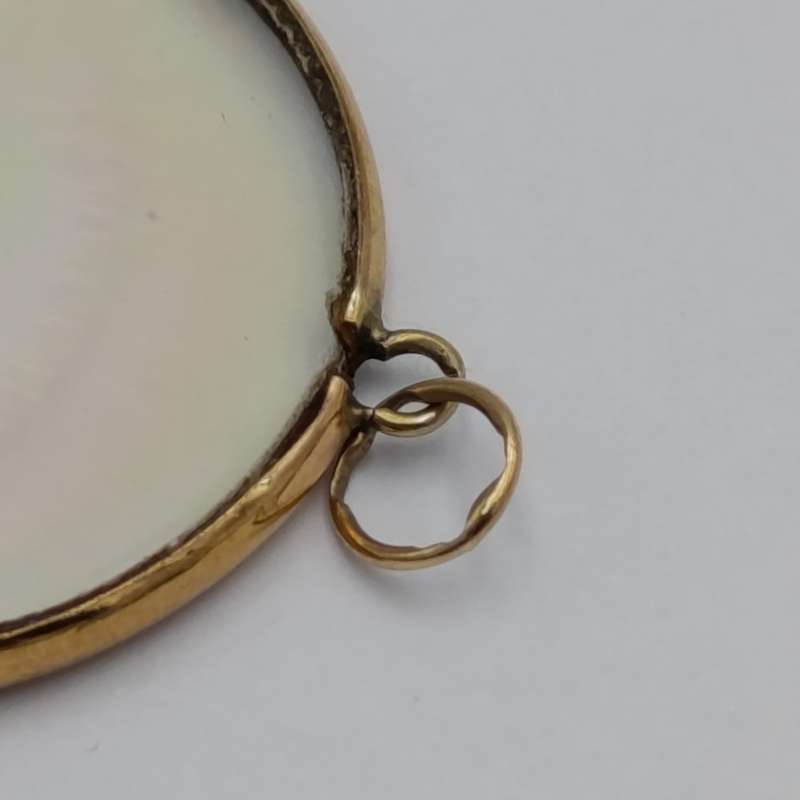 Vintage Hologram eye pendant with 9kt Gold surround