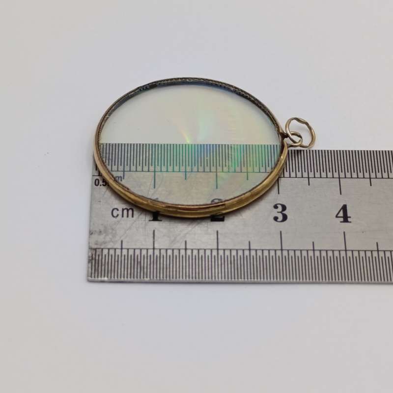 Vintage Hologram eye pendant with 9kt Gold surround