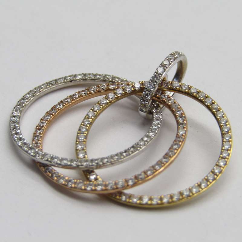 18kt White-, Yellow- and Rose gold diamond pendant with 144 small diamonds - weighs 3,7g