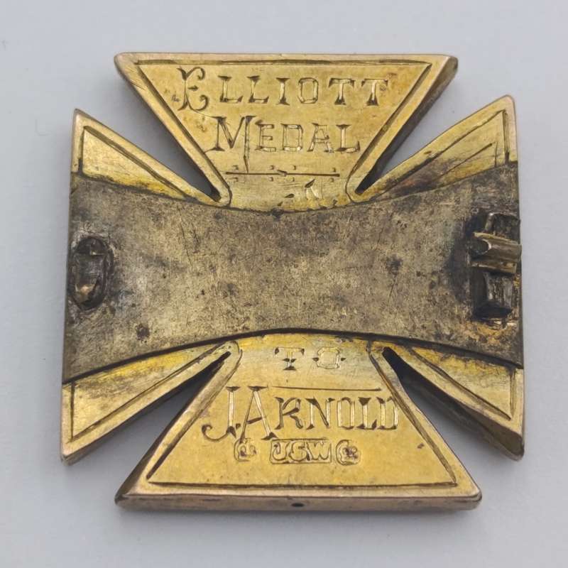 Brooch with Gold inscribed Elliott medal to J. Arnold "CAS 1895"